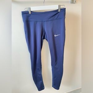 Blue slightly Purple leggings from Nike, with pockets in back and inside lining